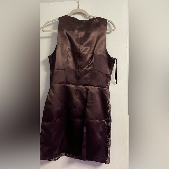 Worn once at an event. Embroidered. It’s that little blk dress but in Burgundy. - Picture 2 of 3